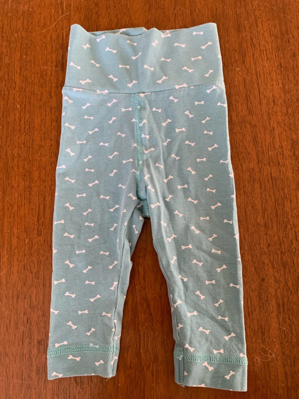 🍊5/$25 H&M Teal Leggings with White Bone Print size 2-4m